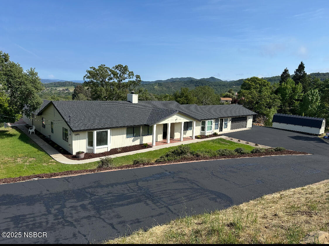 10095 San Marcos Road Atascadero, CA 93422 - Photo 1 of 58 front view of house with a yard
