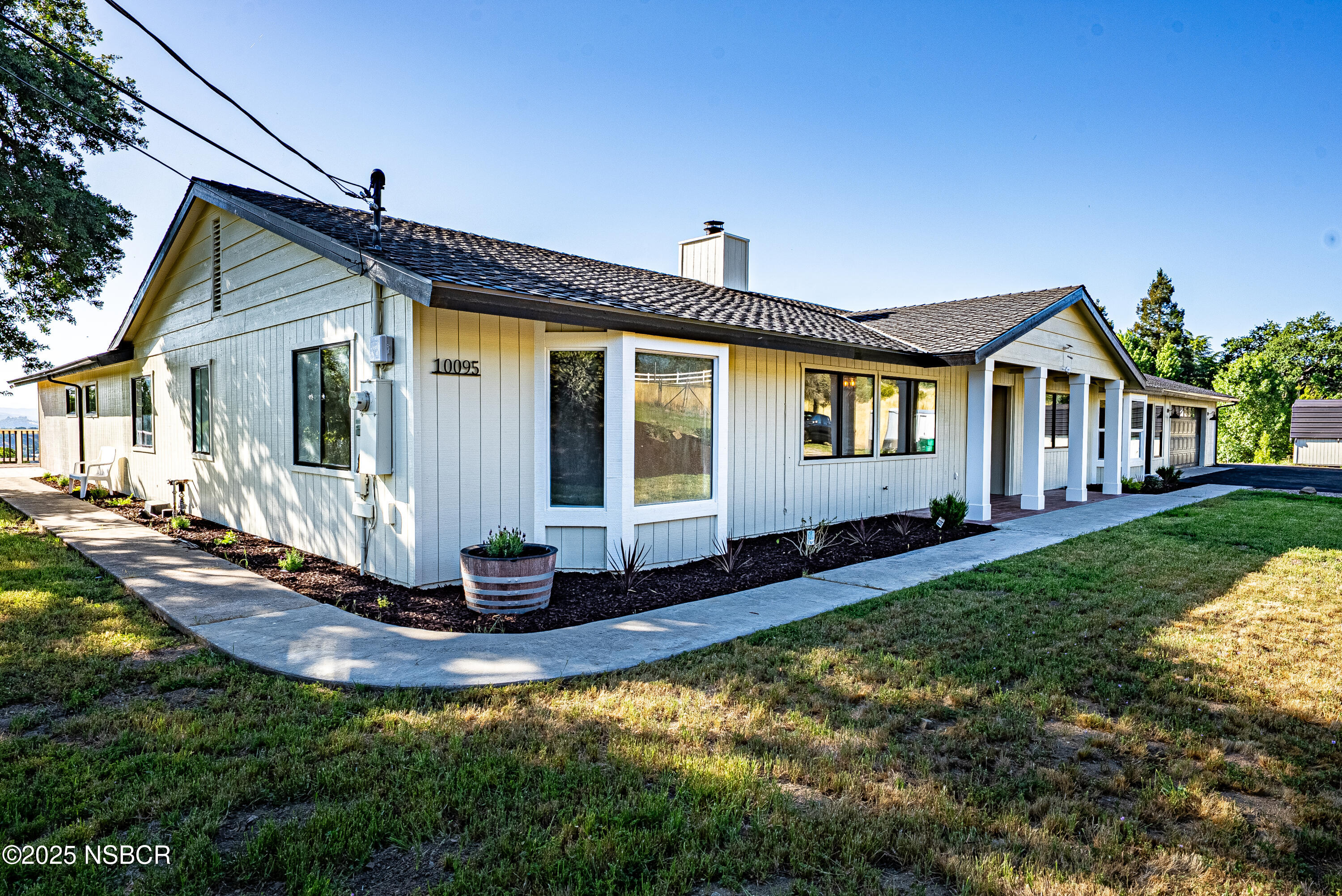 10095 San Marcos Road Atascadero, CA 93422 - Photo 11 of 58 a front view of a house with a yard