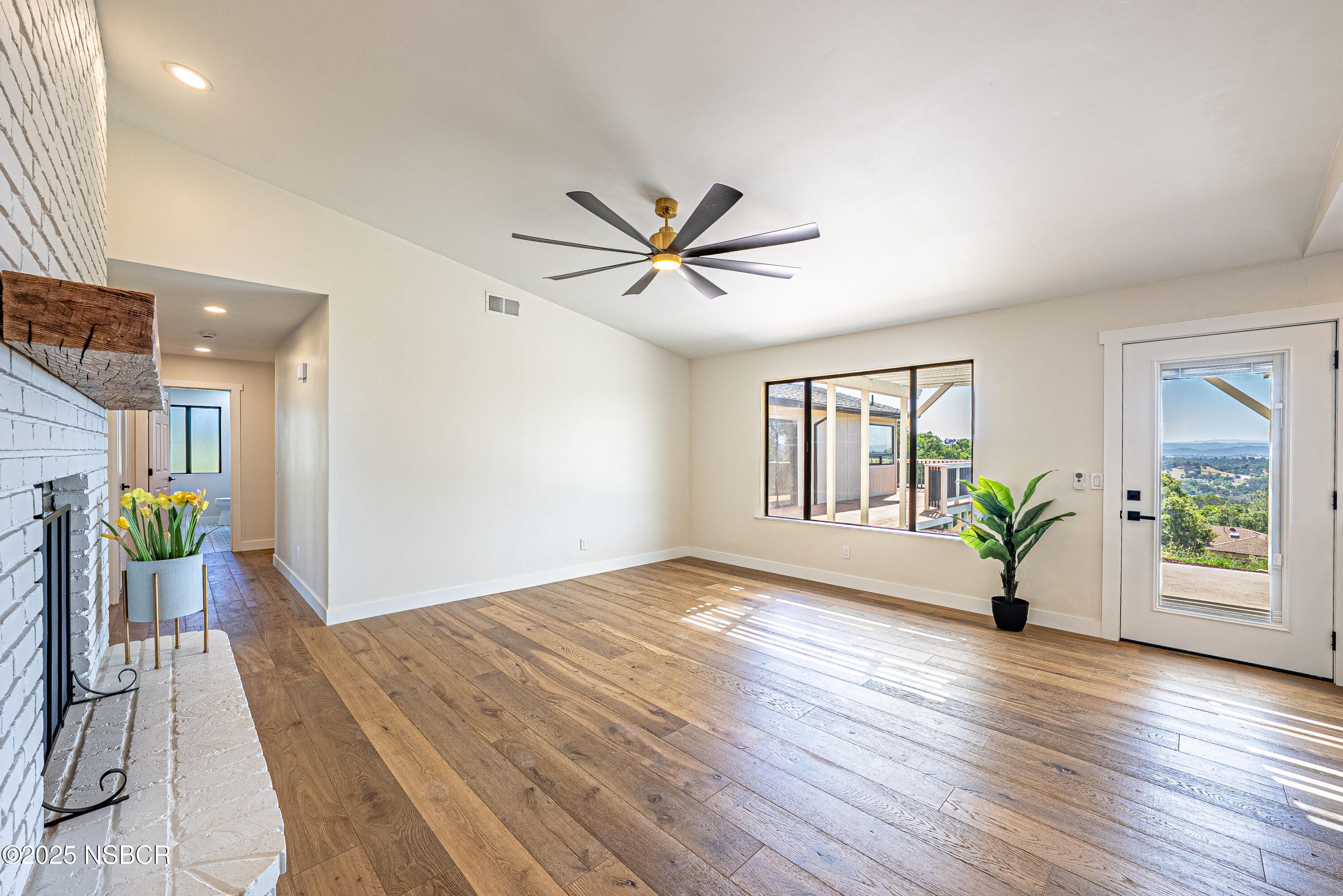 10095 San Marcos Road Atascadero, CA 93422 - Photo 27 of 58 a view of an empty room with window and wooden floor