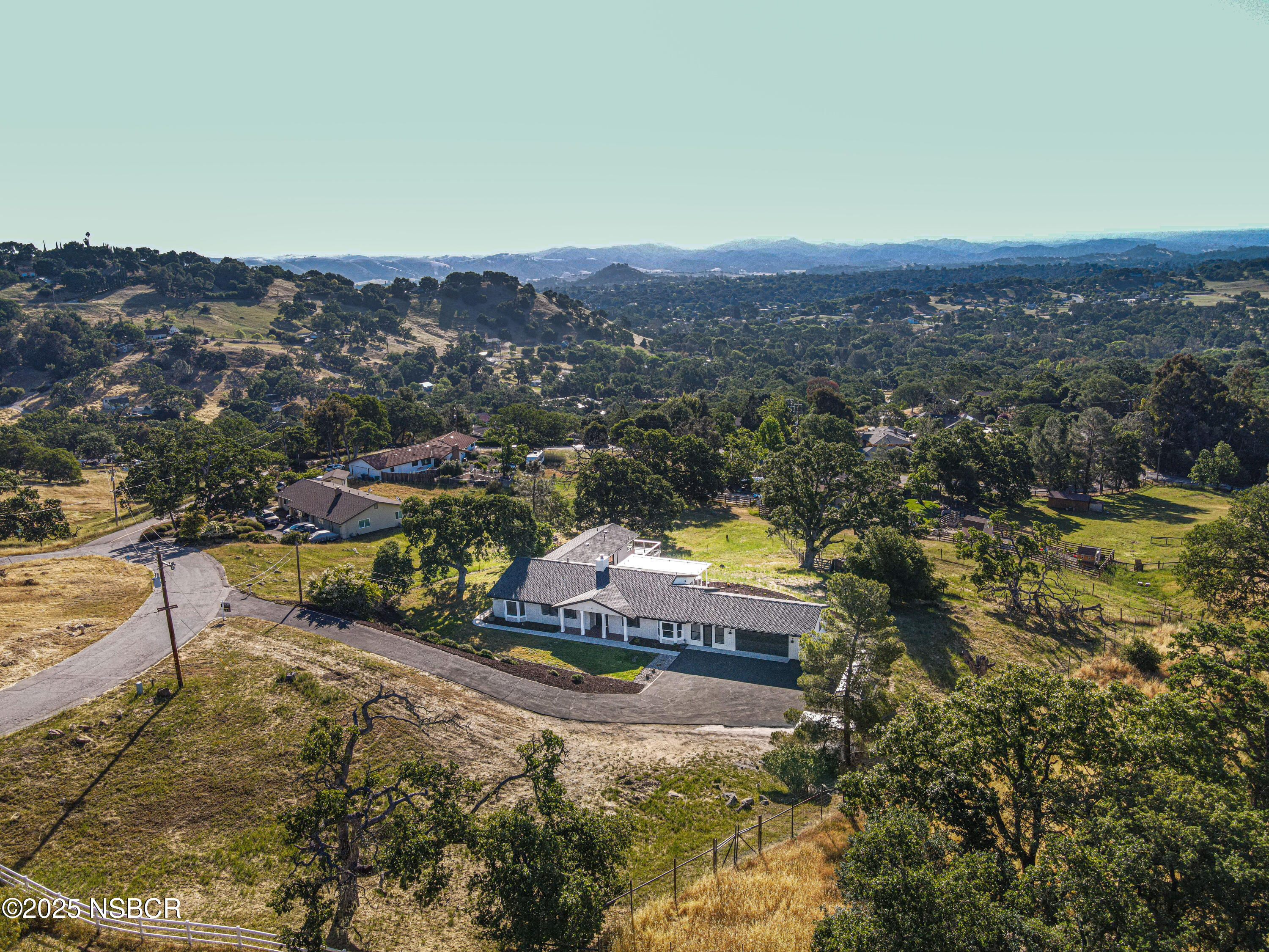 10095 San Marcos Road Atascadero, CA 93422 - Photo 3 of 58 an aerial view of residential houses with outdoor space and swimming pool