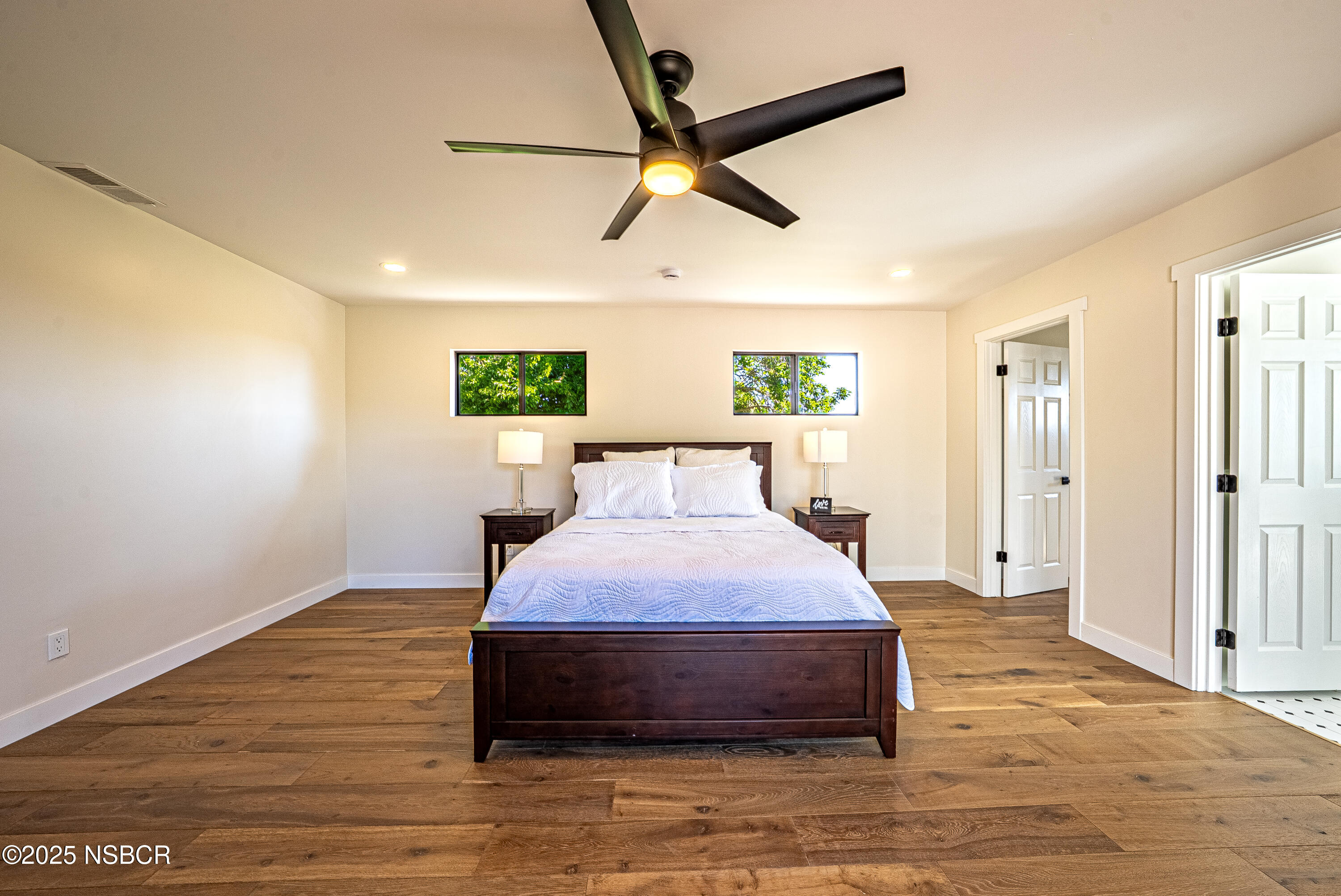 10095 San Marcos Road Atascadero, CA 93422 - Photo 38 of 58 a spacious bedroom with a bed and window