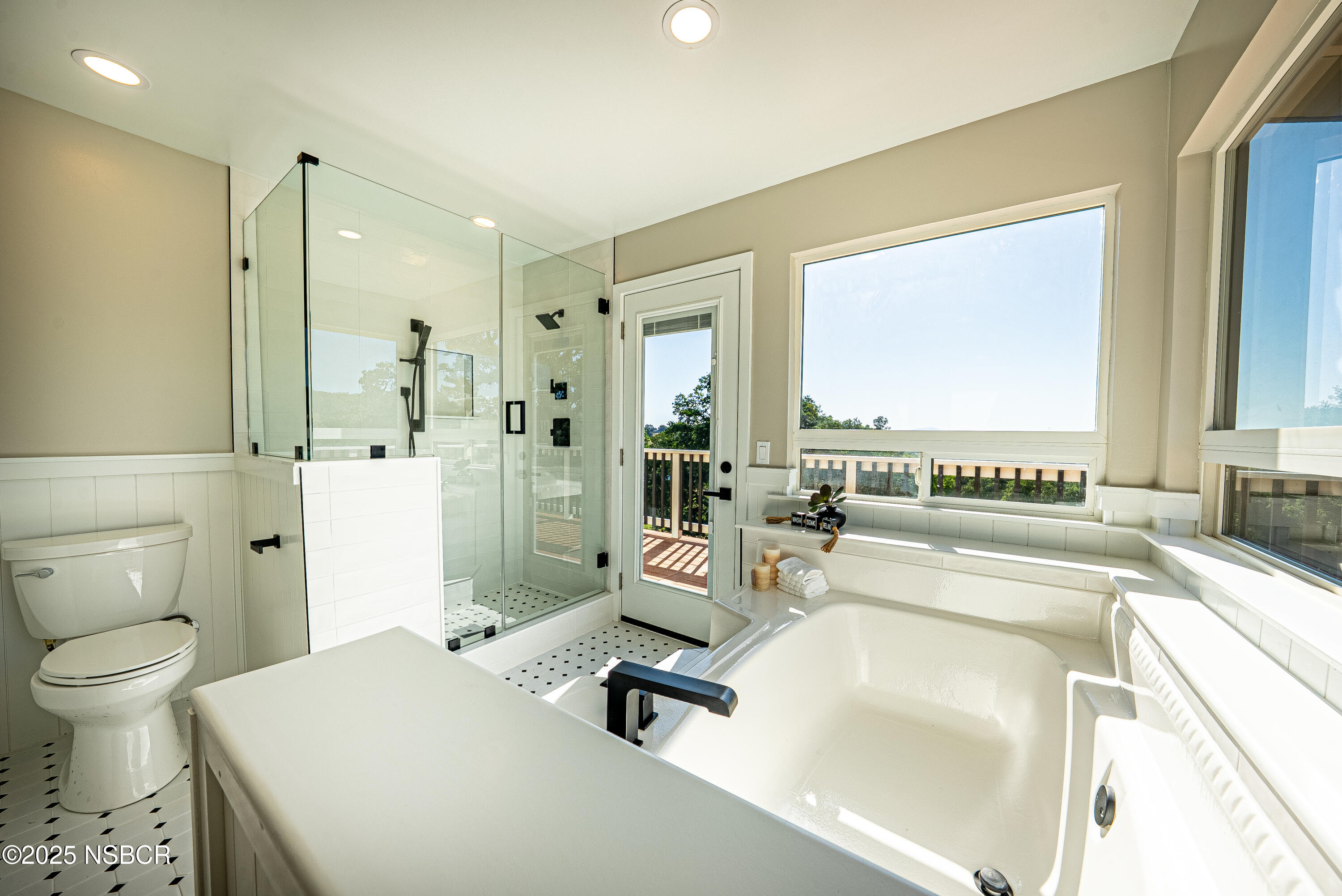 10095 San Marcos Road Atascadero, CA 93422 - Photo 45 of 58 a large white room with a large window and a bath tub