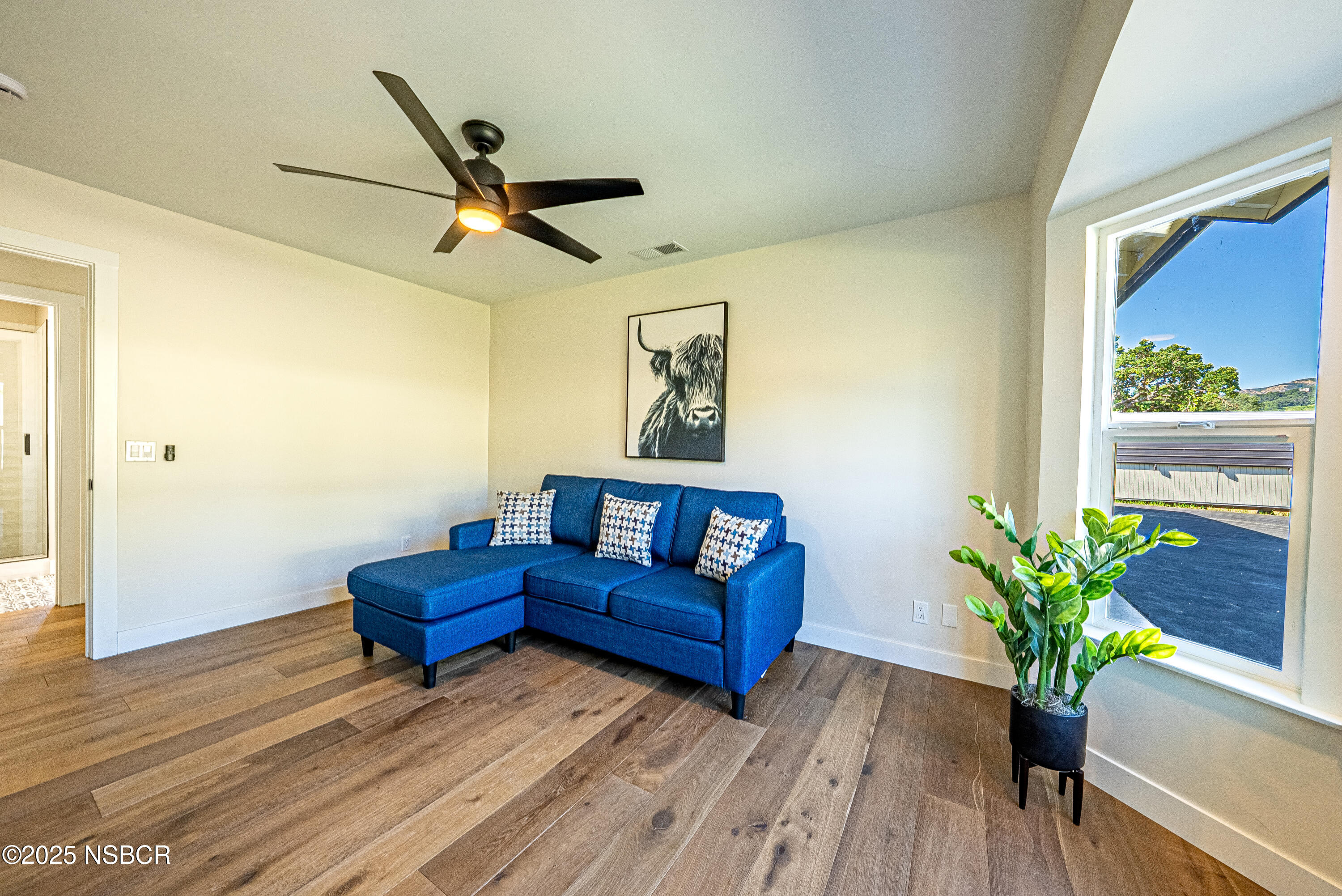 10095 San Marcos Road Atascadero, CA 93422 - Photo 48 of 58 a living room with furniture and a potted plant