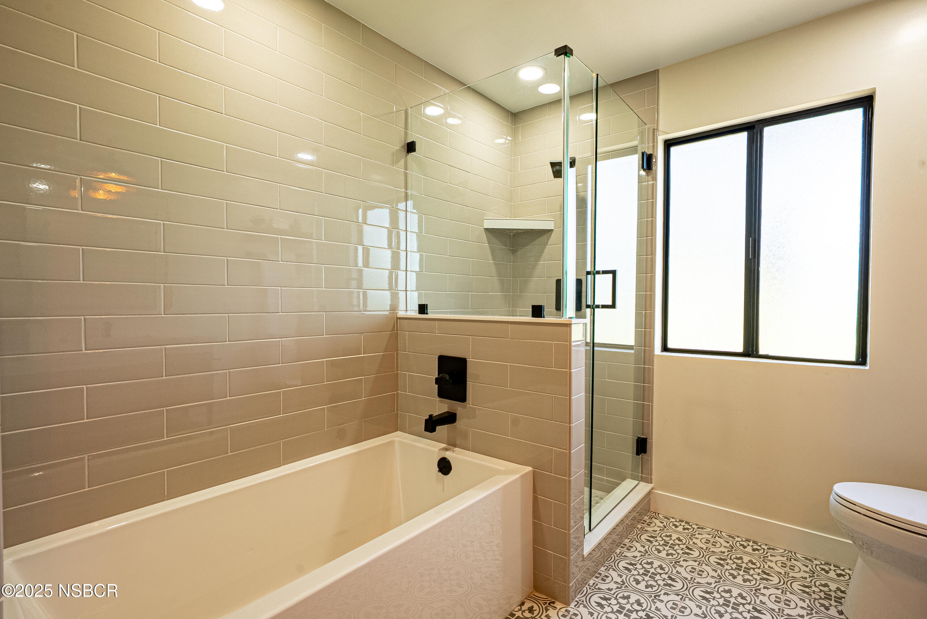 10095 San Marcos Road Atascadero, CA 93422 - Photo 55 of 58 a bathroom with a bathtub a toilet and a shower