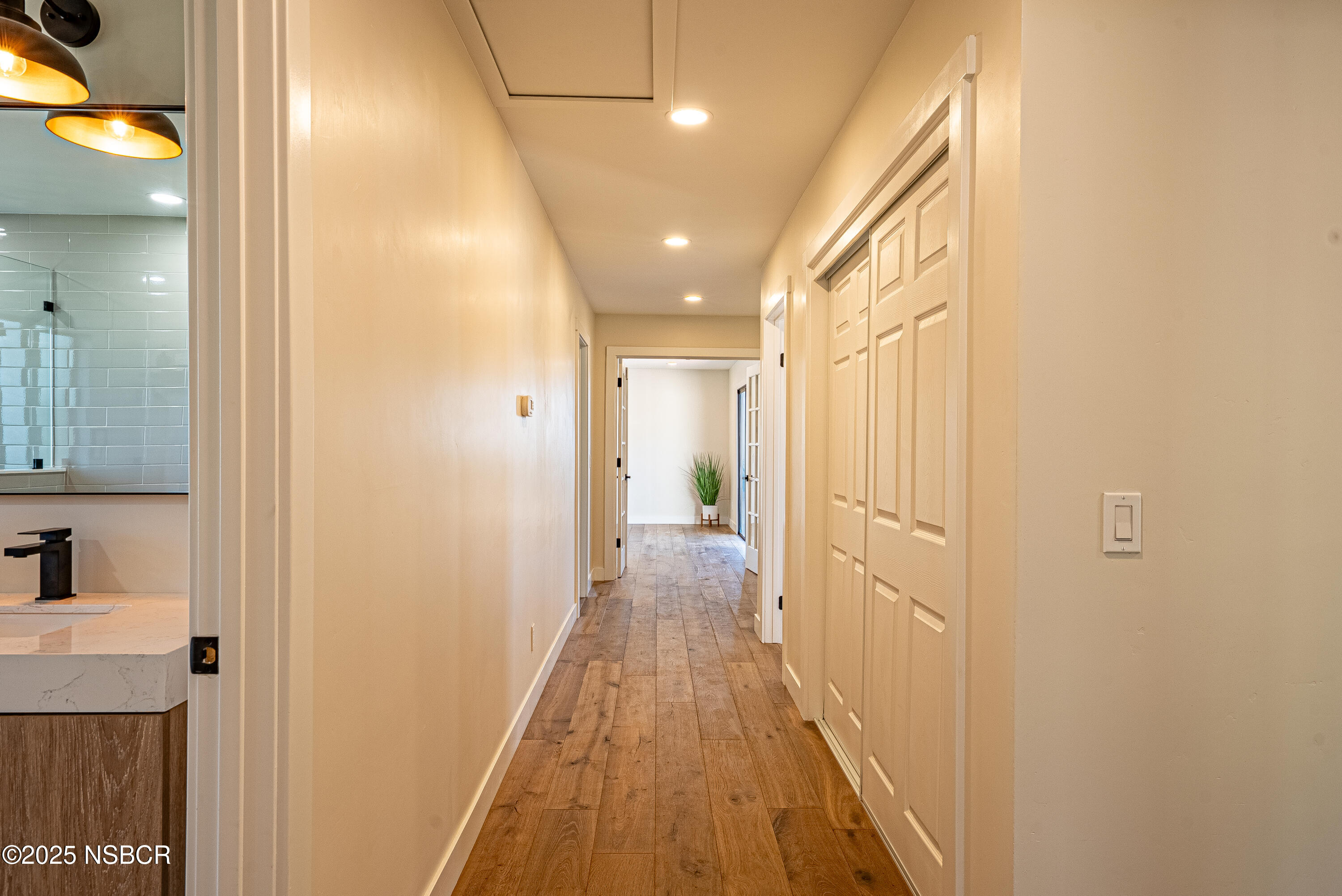 10095 San Marcos Road Atascadero, CA 93422 - Photo 57 of 58 a view of a hallway with wooden floor