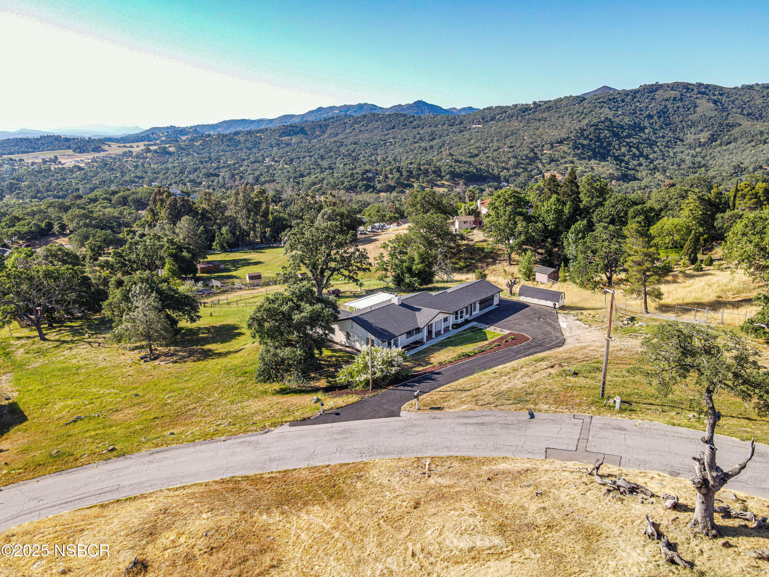 10095 San Marcos Road Atascadero, CA 93422 - Photo 6 of 58 a view of a swimming pool with a mountain