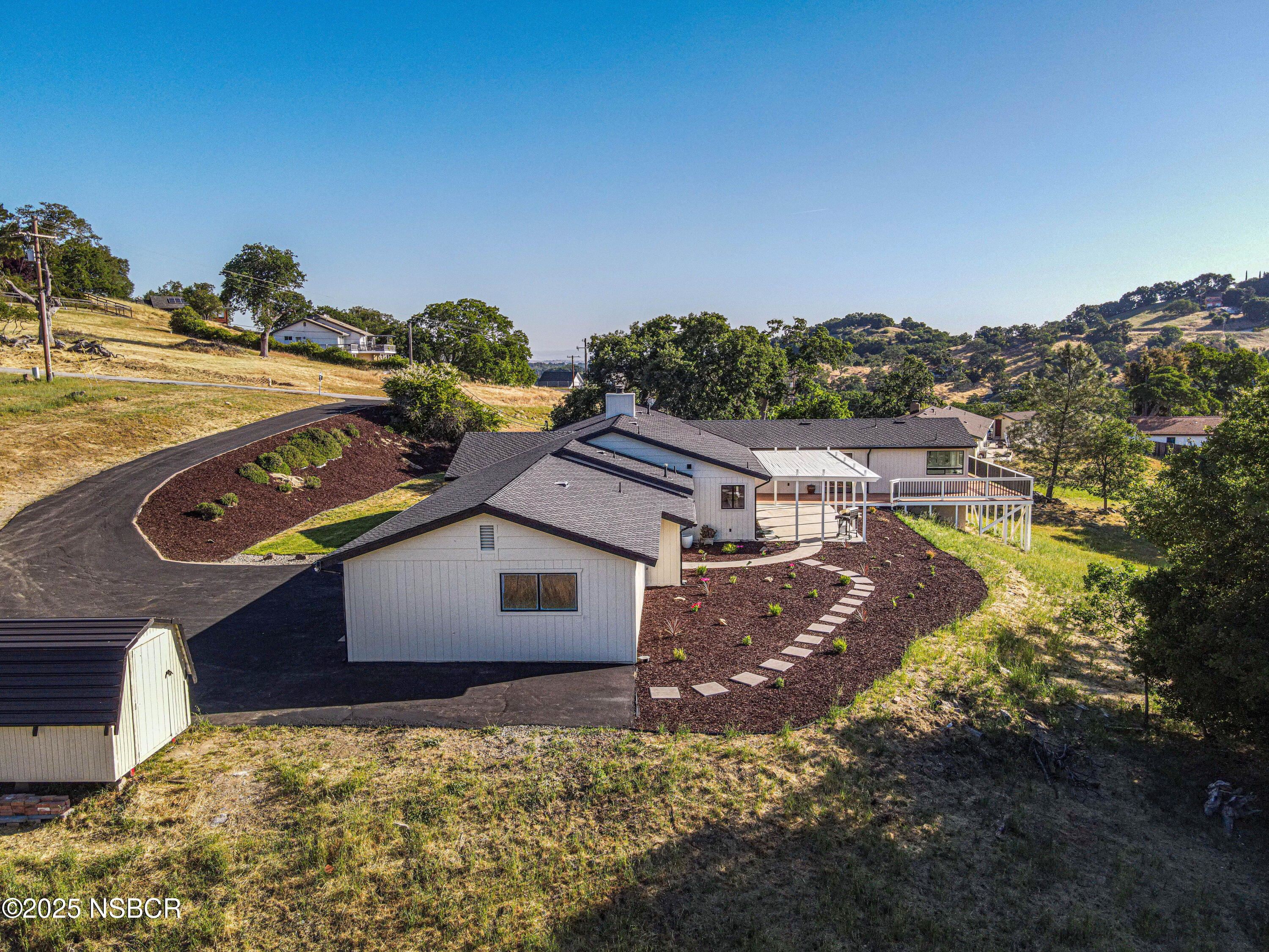 10095 San Marcos Road Atascadero, CA 93422 - Photo 7 of 58 a view of a house with a yard