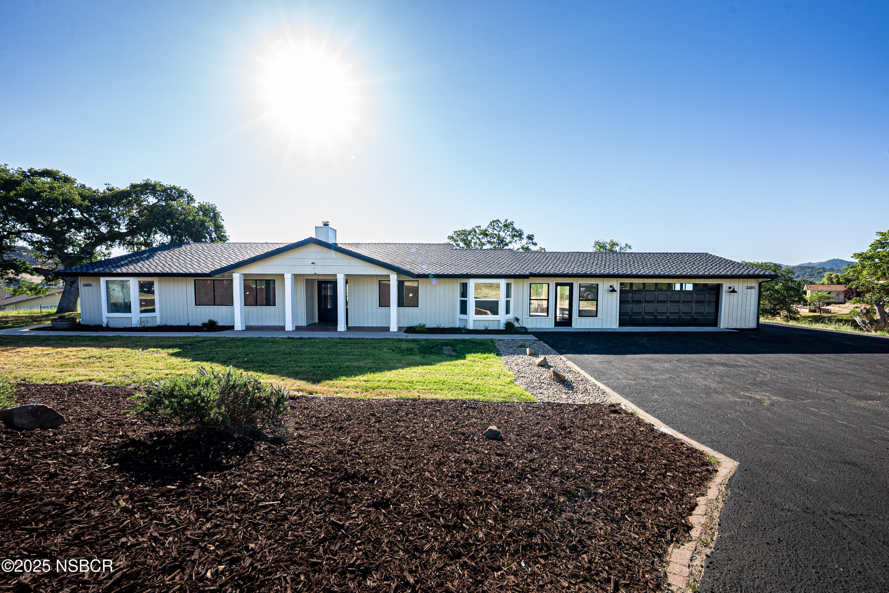 10095 San Marcos Road Atascadero, CA 93422 - Photo 10 of 58 a front view of a house with a yard