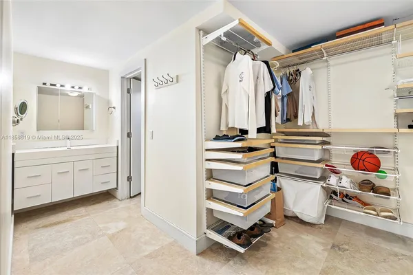 a view of a hallway with washer and dryer