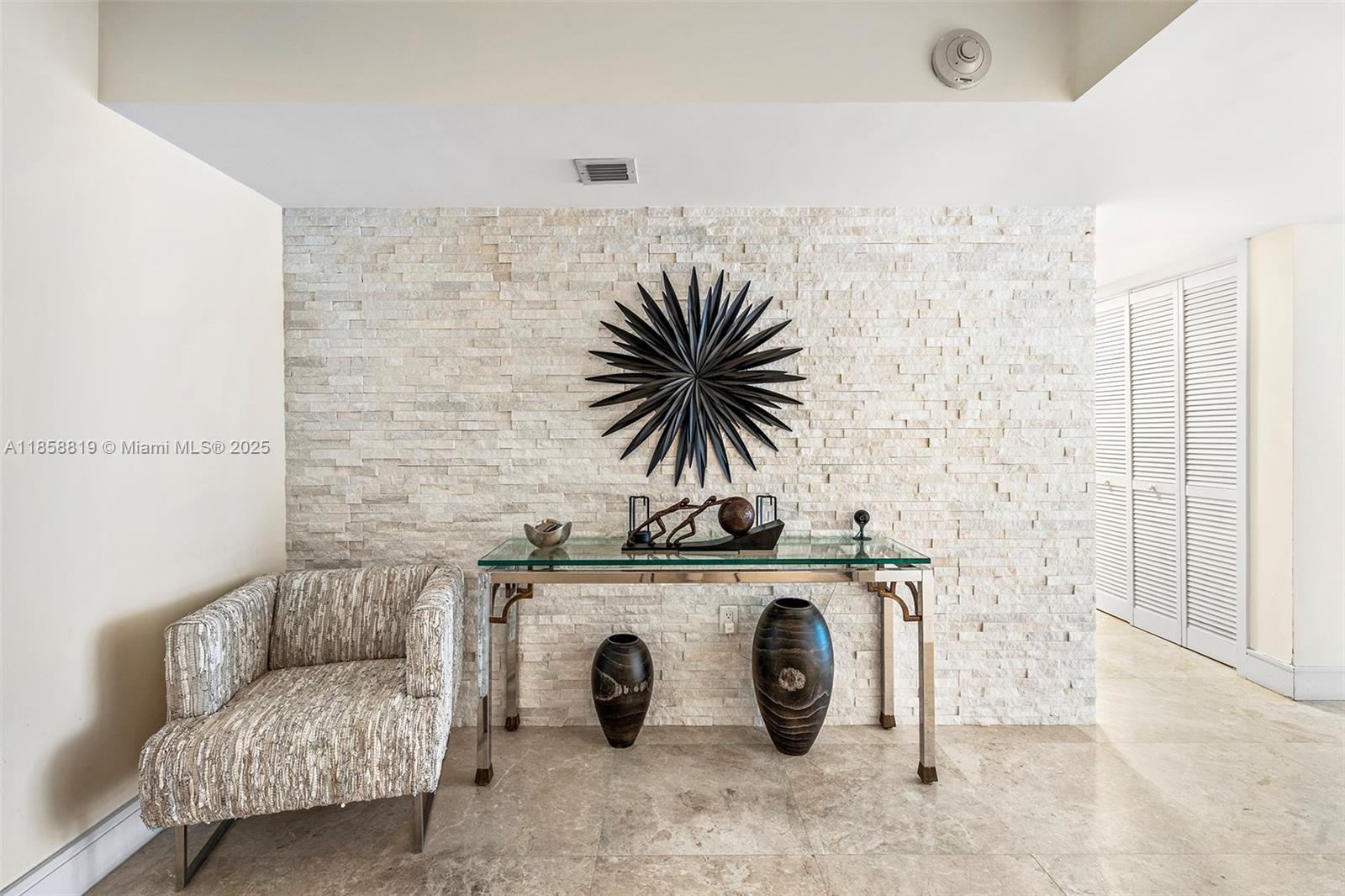 600 Grapetree Drive, Unit 3BS Key Biscayne, FL 33149 - Photo 36 of 47 a living room with furniture and a fireplace