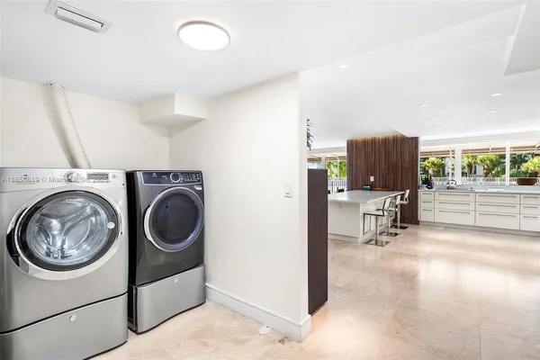 a view of livingroom with washer and dryer