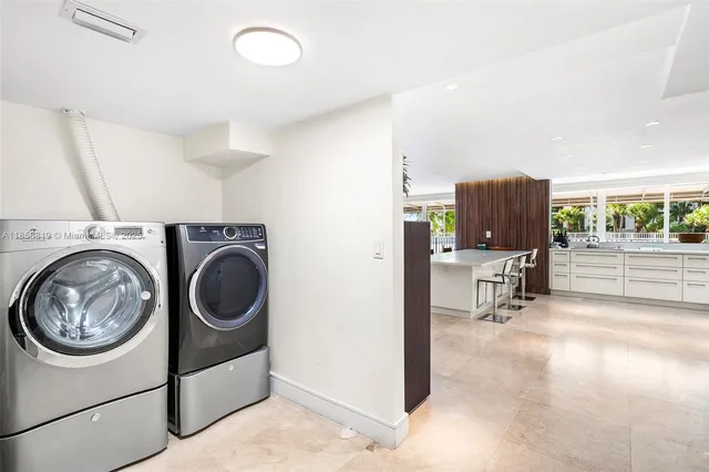 a view of livingroom with washer and dryer