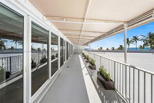 a view of a porch with furniture