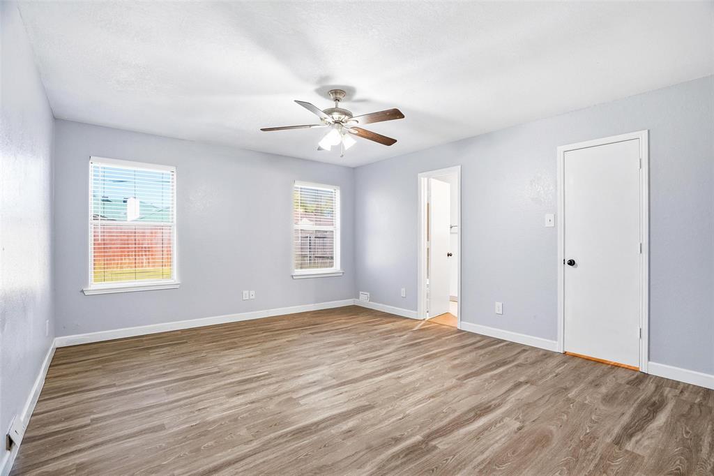 416 Colonial Place Everman, TX 76140 - Photo 11 of 39 a view of an empty room with a window