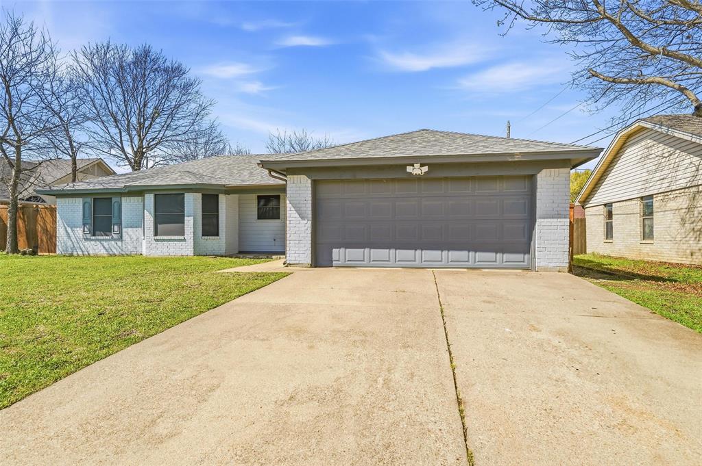416 Colonial Place Everman, TX 76140 - Photo 3 of 39 front view of a house with a yard