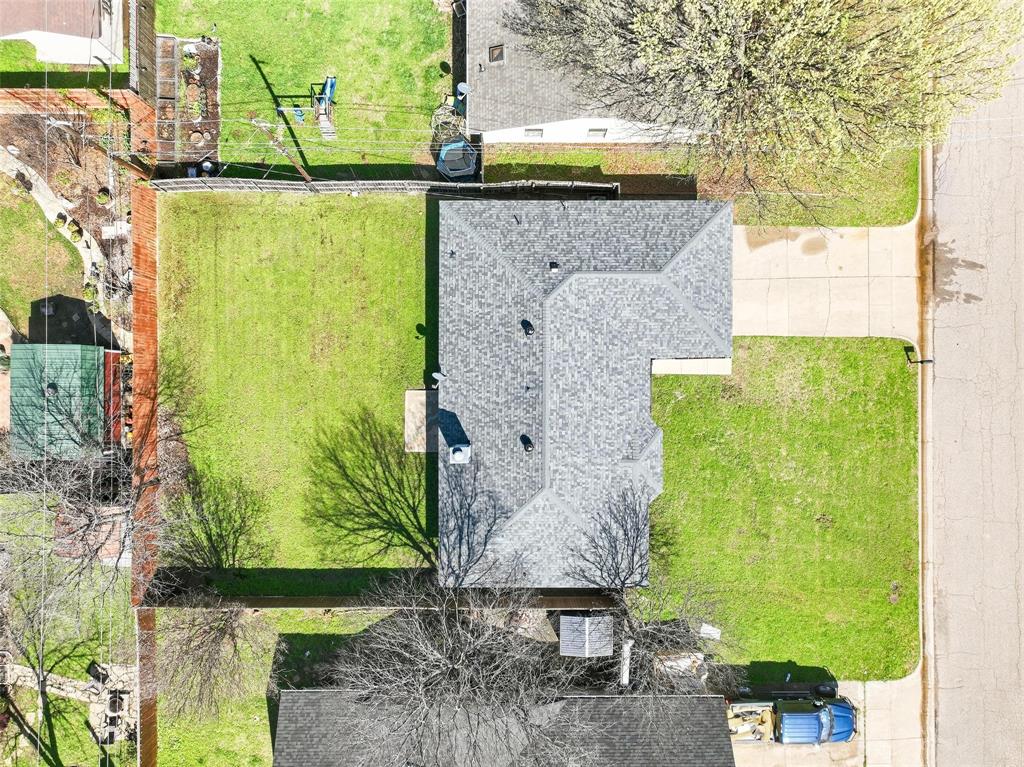 416 Colonial Place Everman, TX 76140 - Photo 37 of 39 a aerial view of a garden