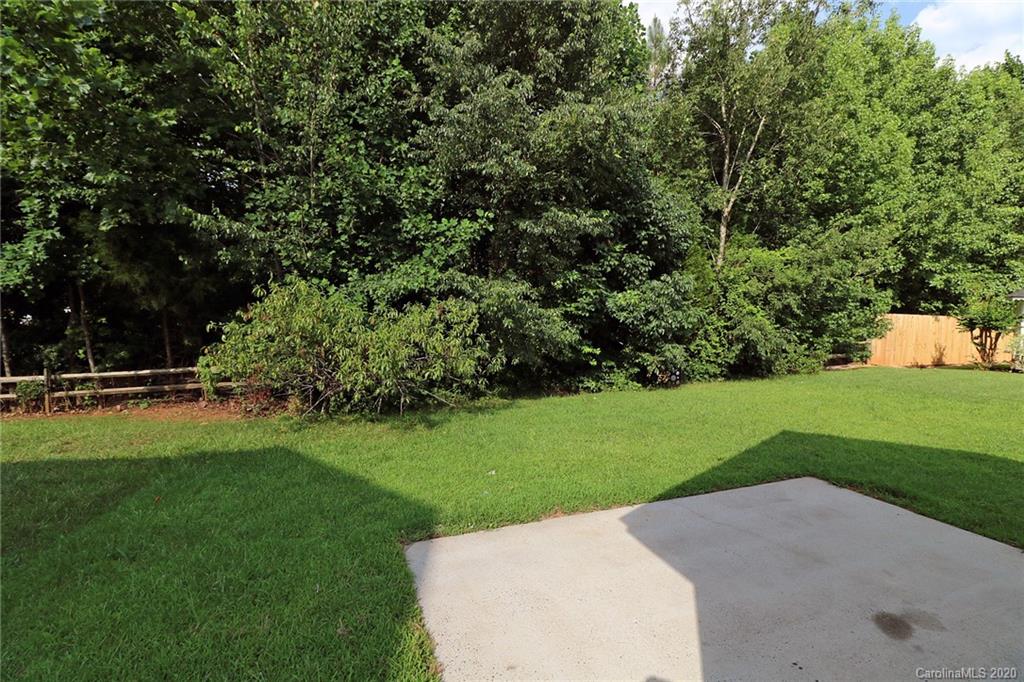 1911 Decatur Court Charlotte, NC 28213 - Photo 16 of 16 a view of a garden with a trampoline
