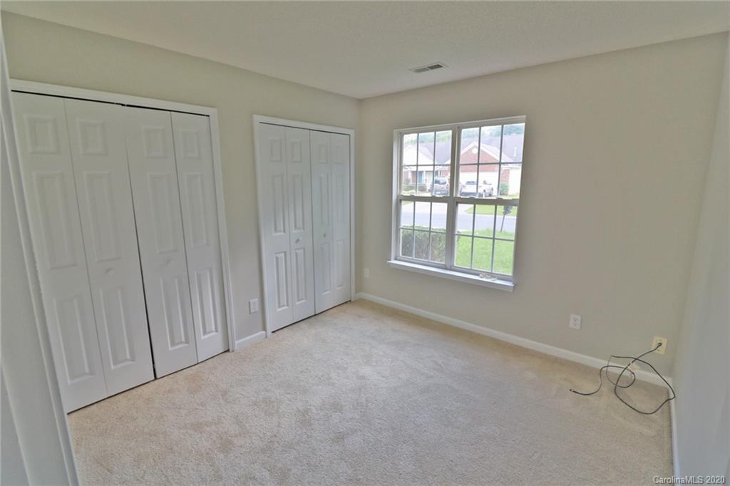 1911 Decatur Court Charlotte, NC 28213 - Photo 8 of 16 a view of an empty room with a window