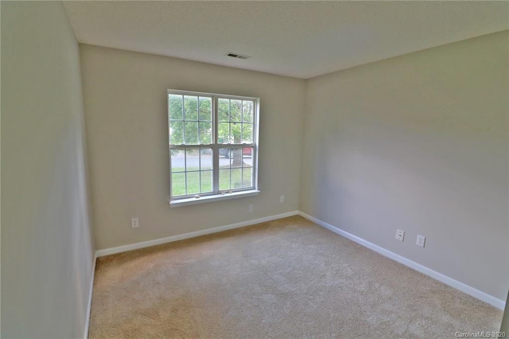 1911 Decatur Court Charlotte, NC 28213 - Photo 9 of 16 an empty room with a window