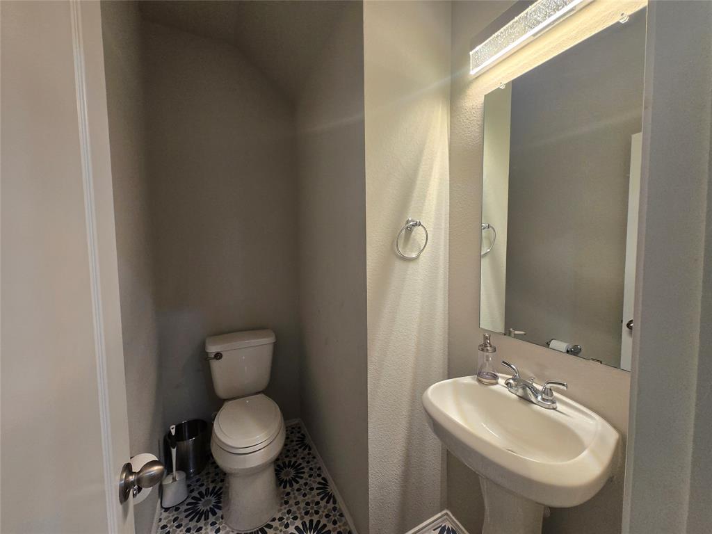 3308 Becker Drive Denton, TX 76207 - Photo 14 of 15 Half bathroom located down stairs