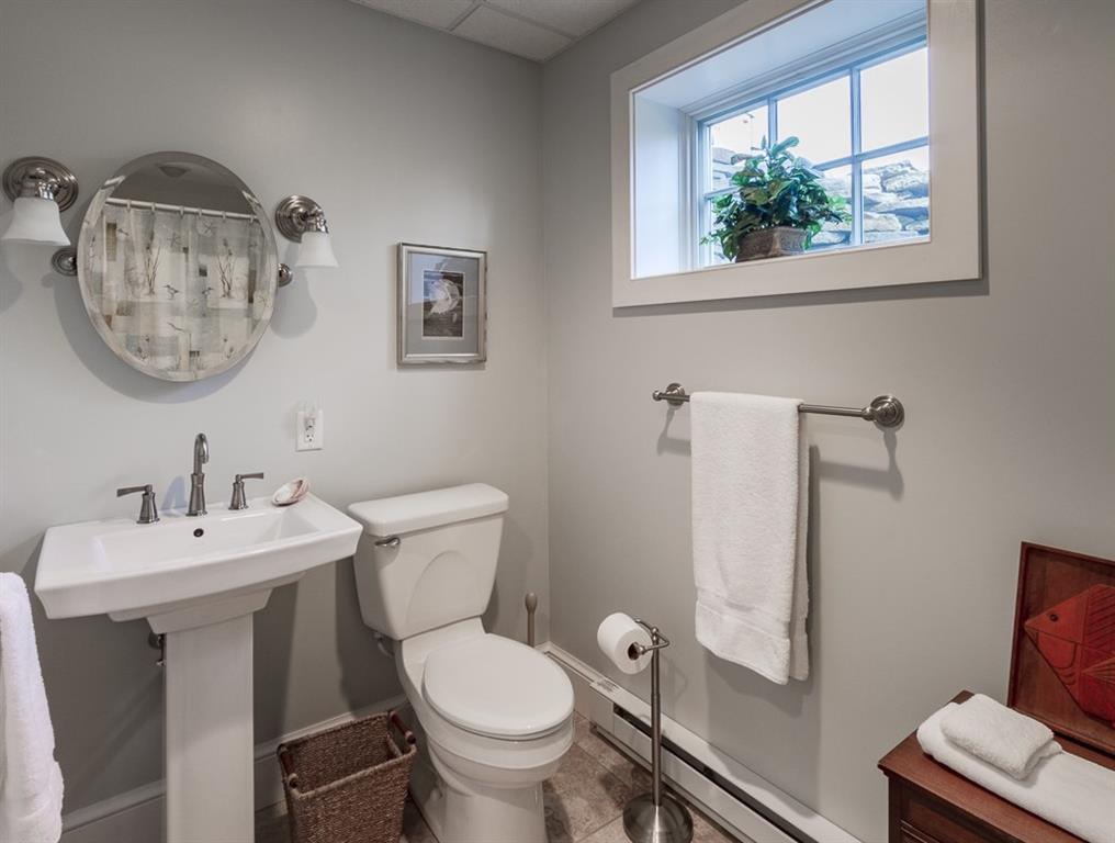37 Burnham Cove Road Boothbay, ME 04537 - Photo 16 of 29 Lower level bath with bathtub.