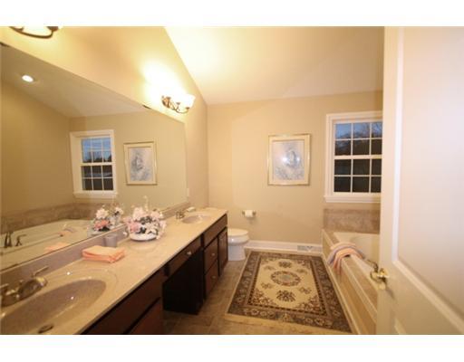 145 Julia Road Sarver, PA 16055 - Photo 14 of 18 Master Bath/Spa. Step into the master bath and let the double bowl sinks with cherry cabinetry greet you.