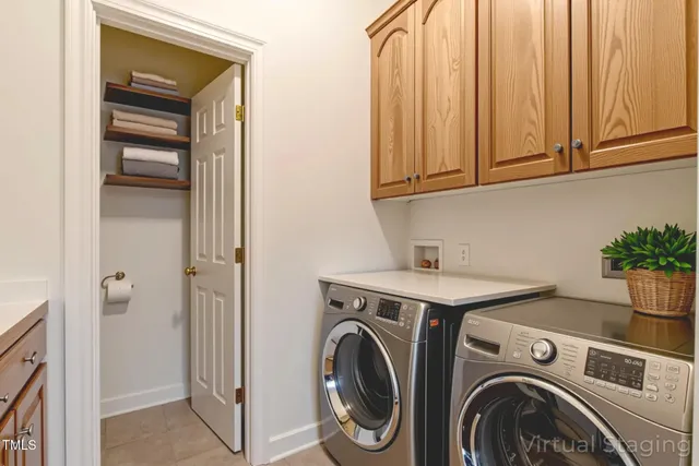 a kitchen with a sink and a refrigerator