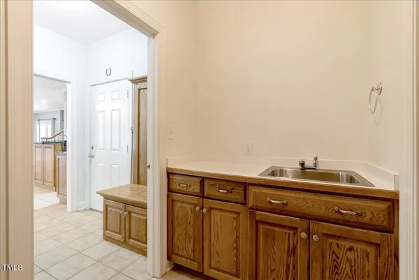 a bedroom with a bed and a cabinets