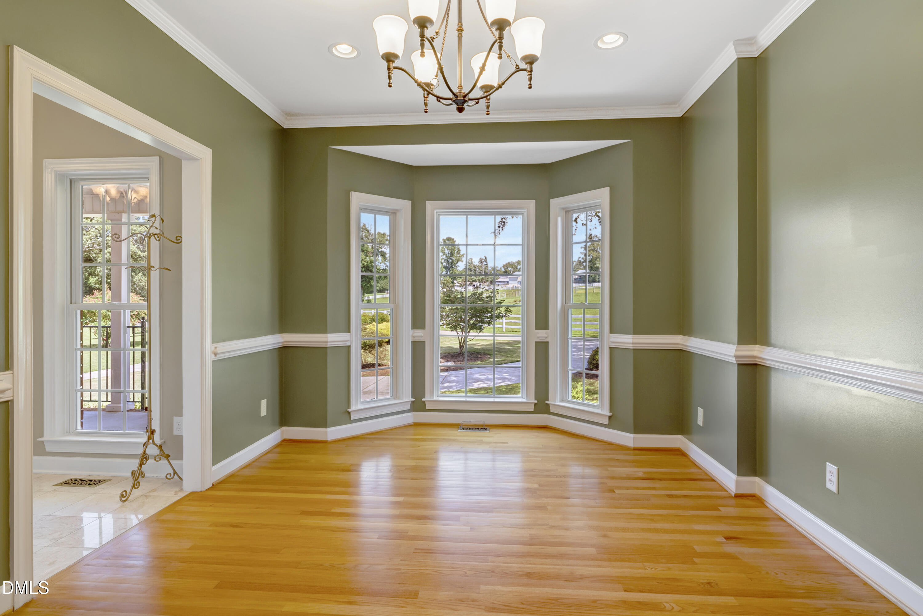 1086 Roberts Chapel Road Stem, NC 27581 - Photo 23 of 33 a view of an empty room with a fireplace and a window