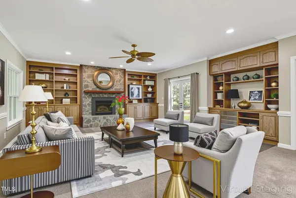 a bedroom with a large bed and a couch