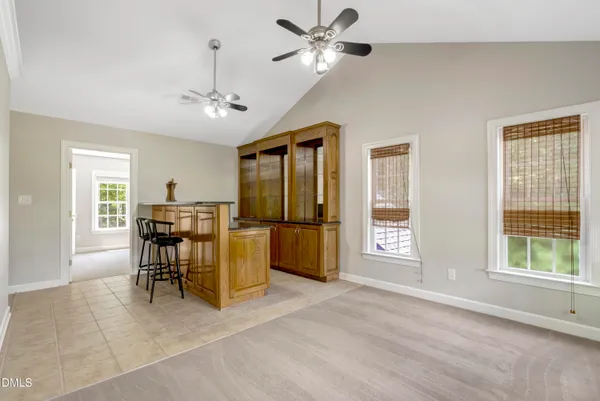 a view of livingroom with furniture and floor to ceiling window