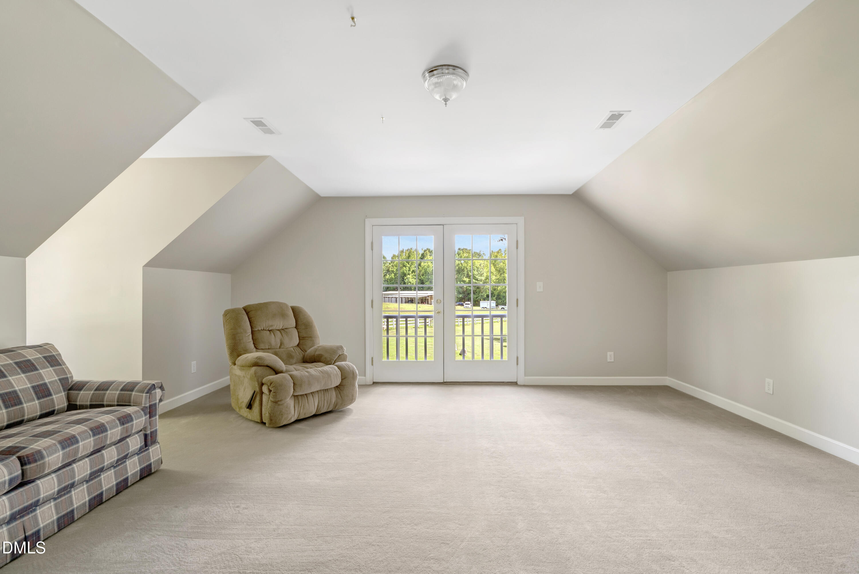 1086 Roberts Chapel Road Stem, NC 27581 - Photo 32 of 33 a view of livingroom with furniture and floor to ceiling window