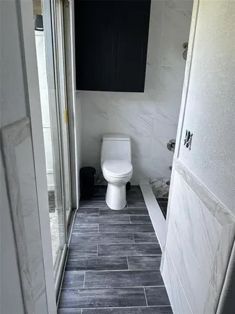 a bathroom with a sink and toilet