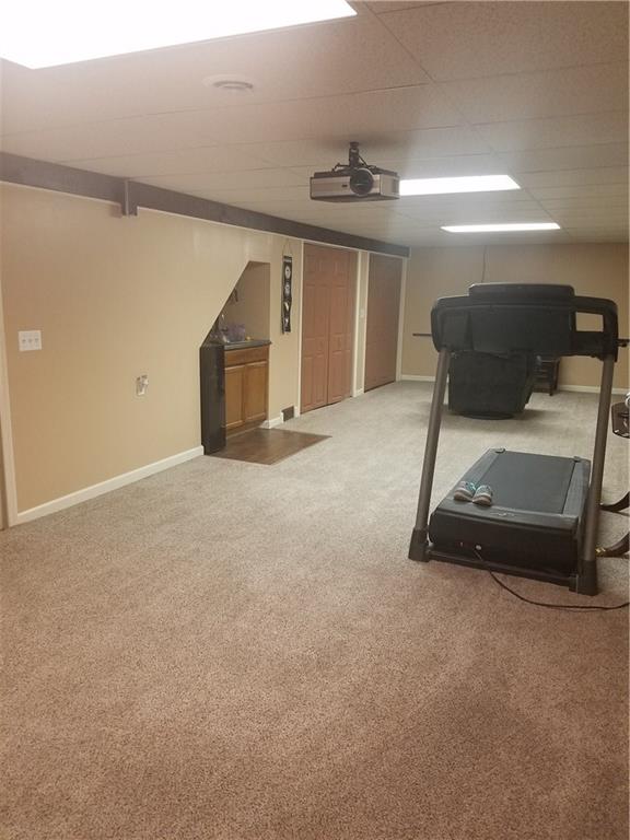 218 Indiana Road Creekside, PA 15732 - Photo 20 of 24 Basement Family Room showing wet bar and closet areas