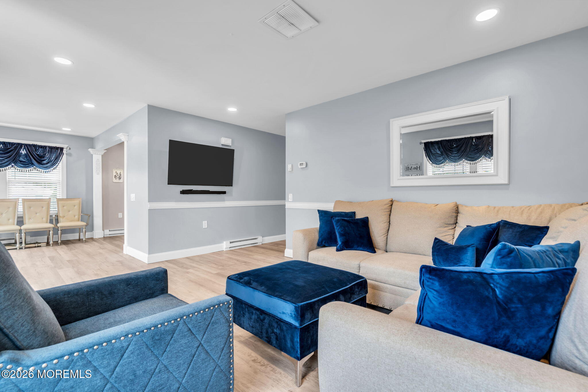 7A Amherst Road, Unit A Whiting, NJ 08759 - Photo 1 of 18 a living room with furniture and a flat screen tv