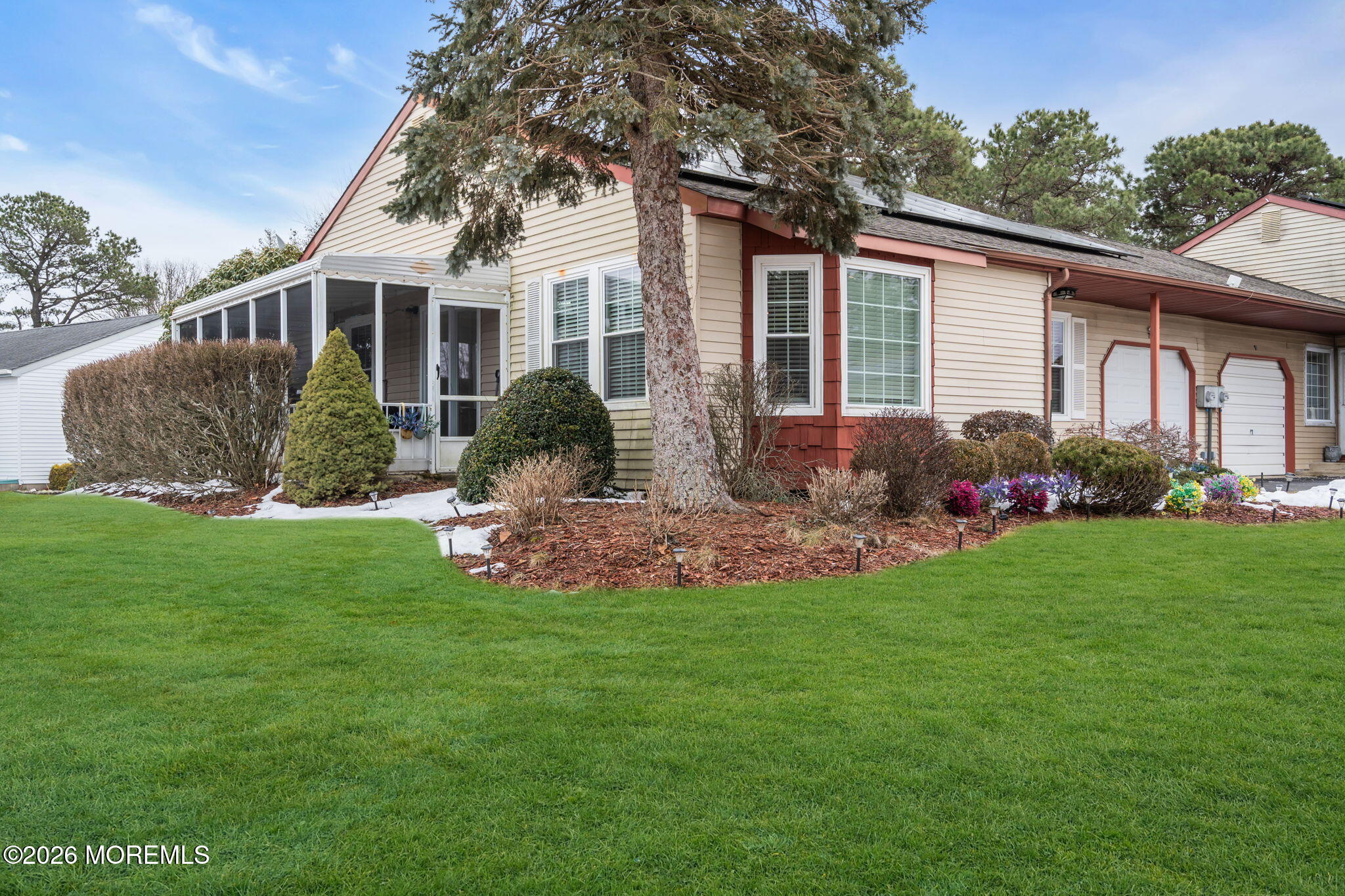 7A Amherst Road, Unit A Whiting, NJ 08759 - Photo 14 of 18 a front view of house with yard and green space