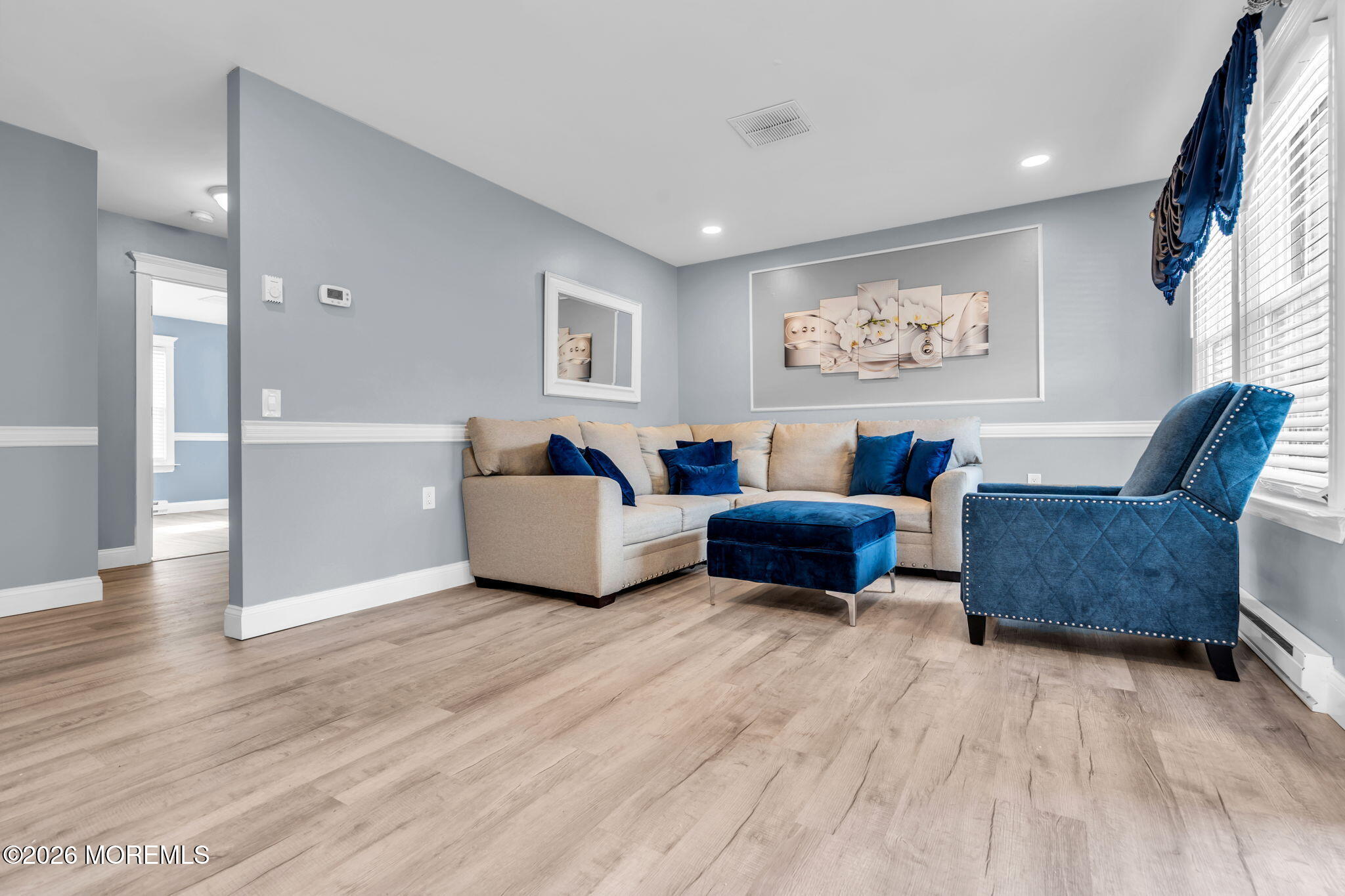 7A Amherst Road, Unit A Whiting, NJ 08759 - Photo 2 of 18 a living room with furniture and a wooden floor