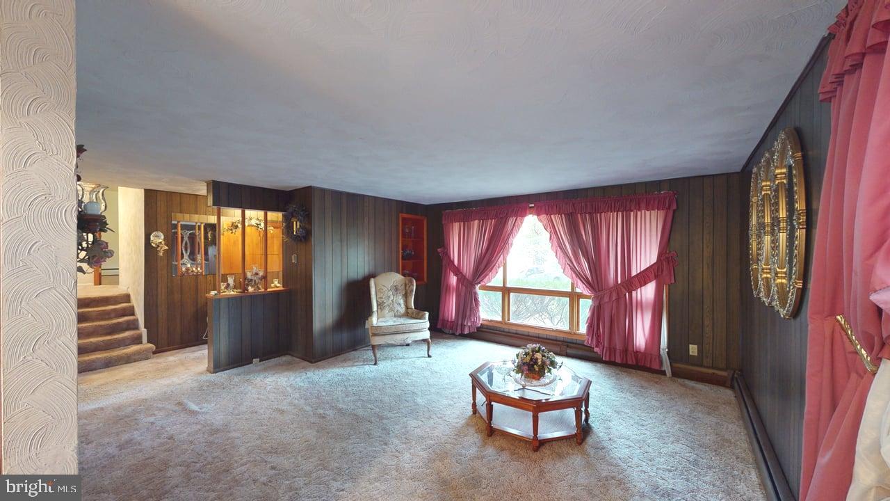 4549 Georges Run Road Ridgeley, WV 26753 - Photo 15 of 48 a living room with furniture and a window