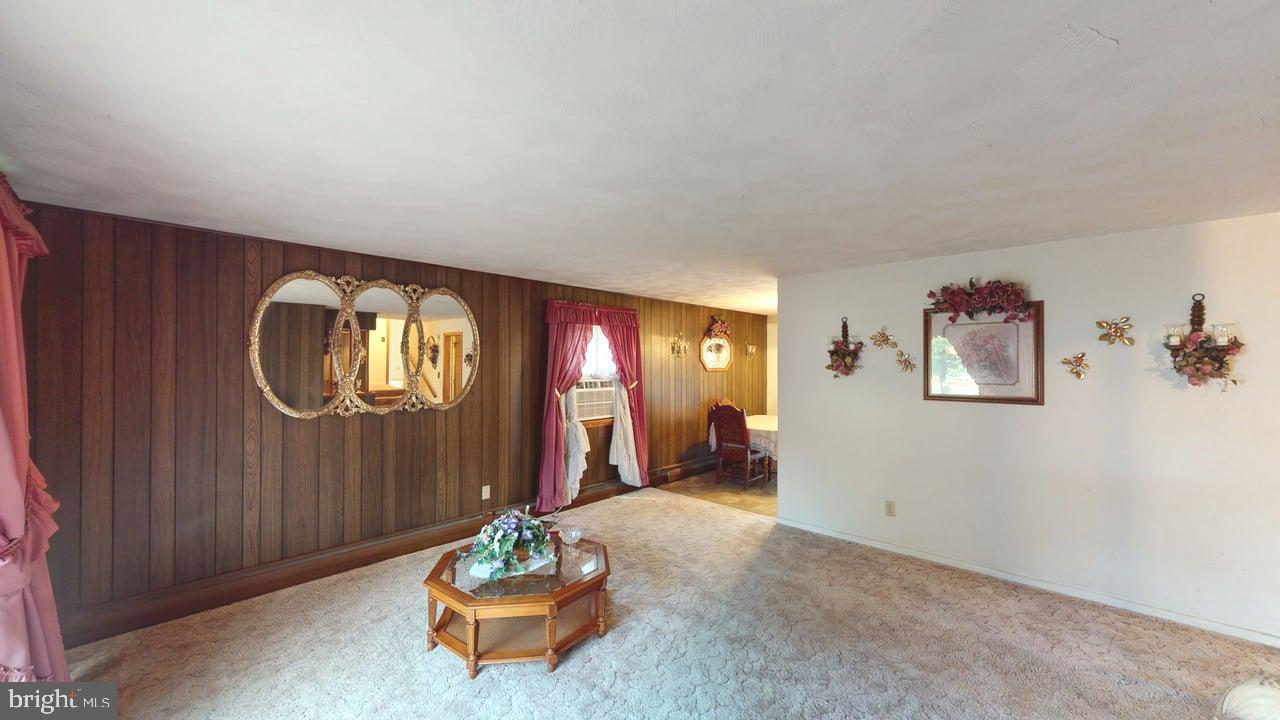 4549 Georges Run Road Ridgeley, WV 26753 - Photo 18 of 48 a living room with furniture and a window