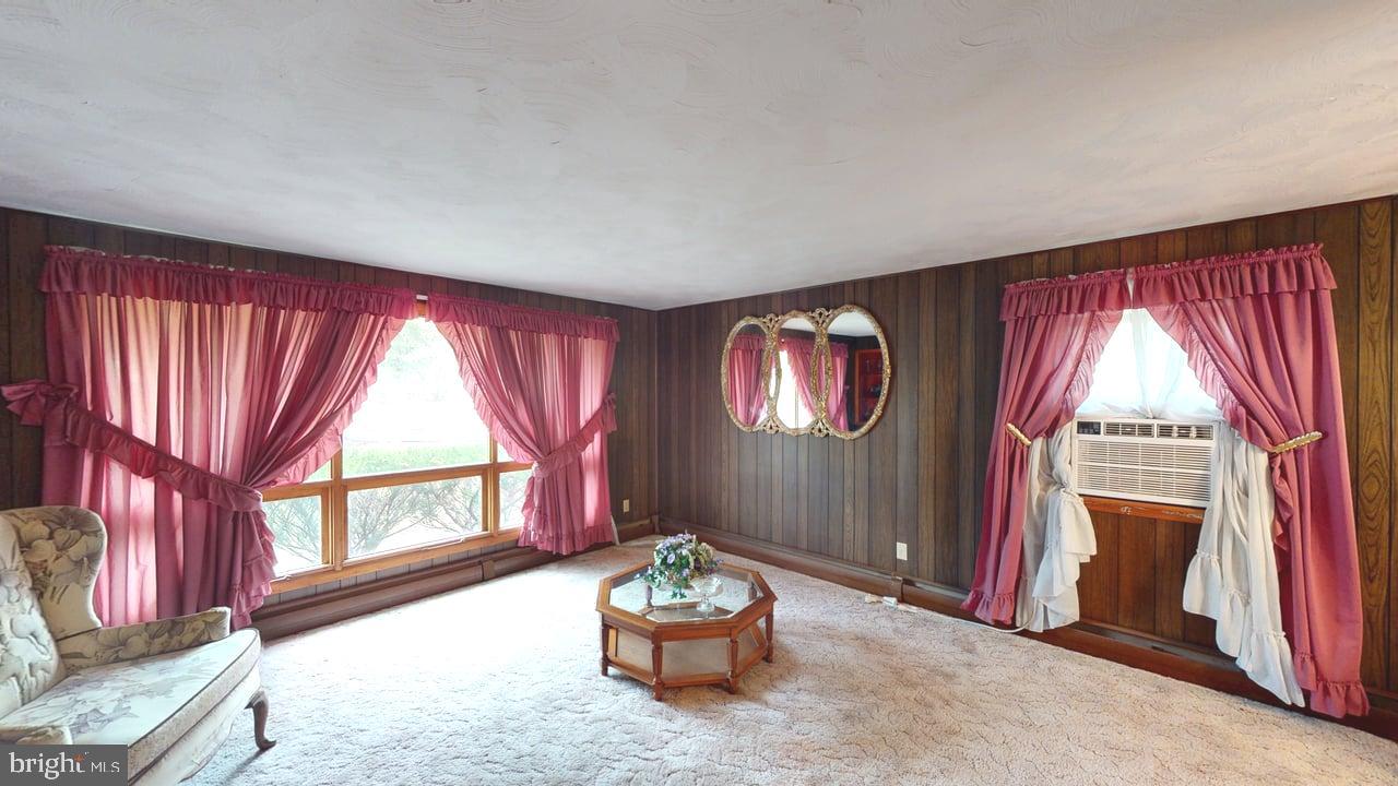 4549 Georges Run Road Ridgeley, WV 26753 - Photo 19 of 48 a living room with furniture and a window