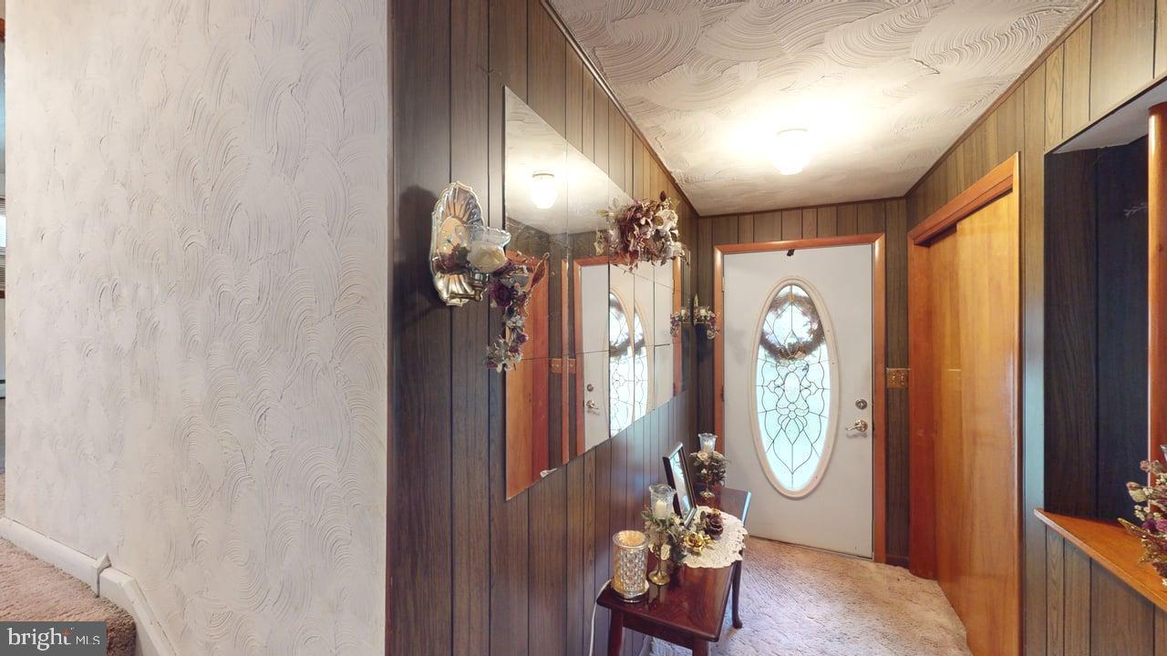 4549 Georges Run Road Ridgeley, WV 26753 - Photo 20 of 48 a view of a livingroom with furniture wooden floor and window