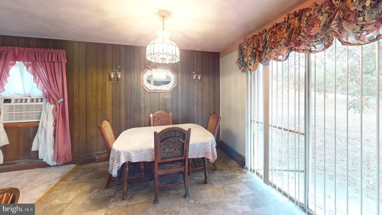 4549 Georges Run Road Ridgeley, WV 26753 - Photo 45 of 48 a view of a dining room with furniture and window