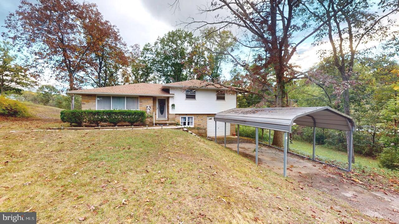 4549 Georges Run Road Ridgeley, WV 26753 - Photo 5 of 48 a house with swimming pool in front of it