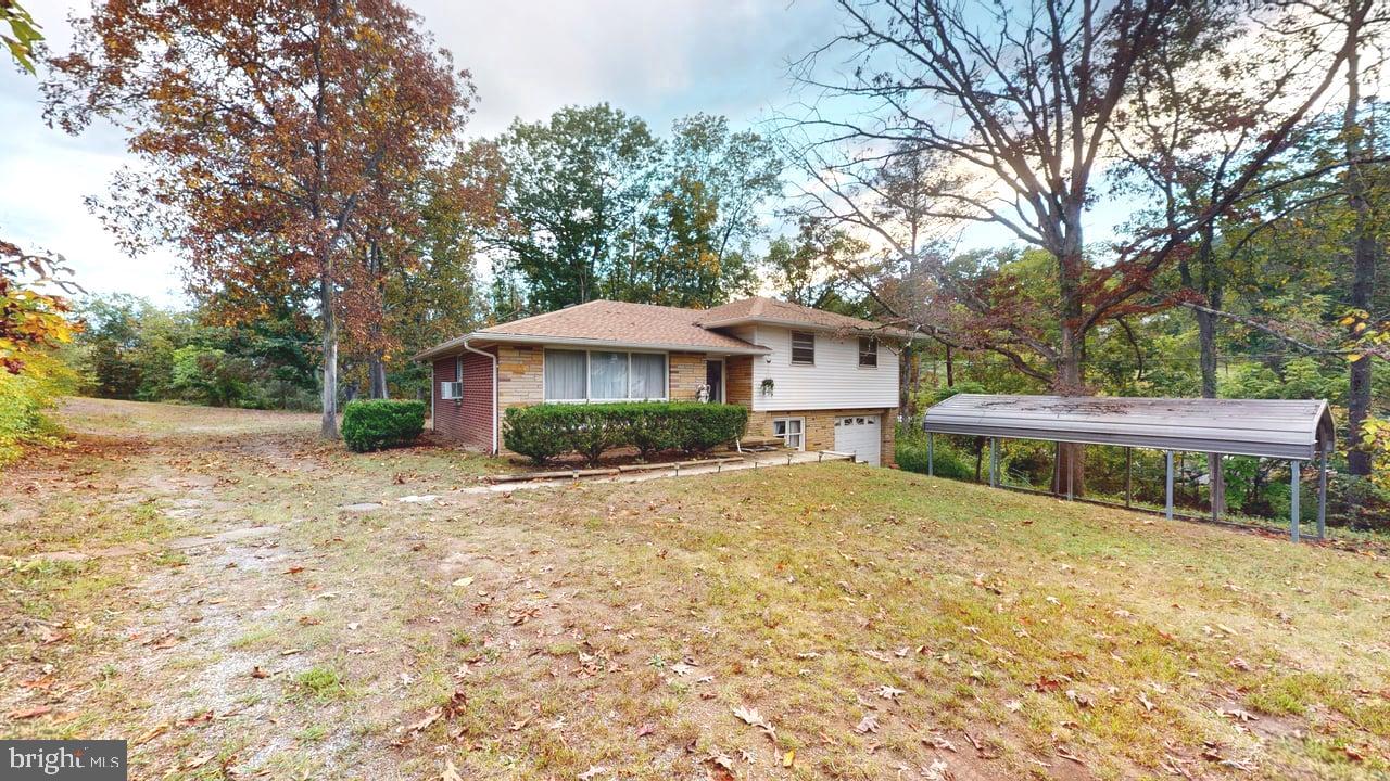 4549 Georges Run Road Ridgeley, WV 26753 - Photo 6 of 48 a view of a house with a yard