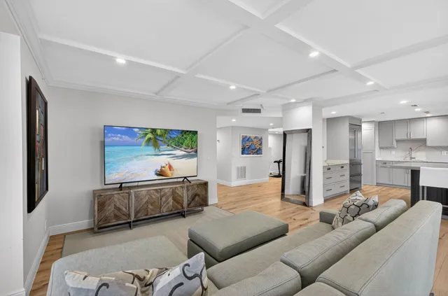 a living room with furniture and a table