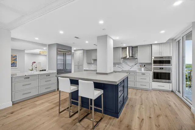 a utility room with sink dryer and washer