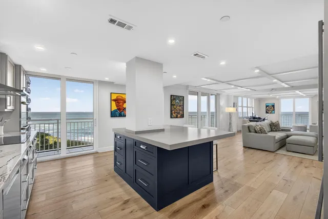 a bathroom with double sink and a mirror