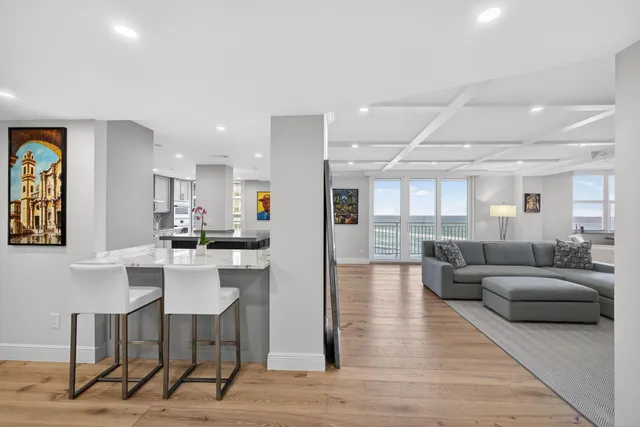 a living room with furniture and a table