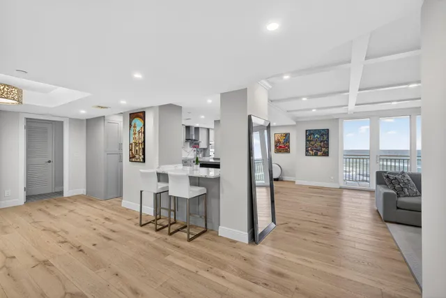 a view of a livingroom with furniture and windows
