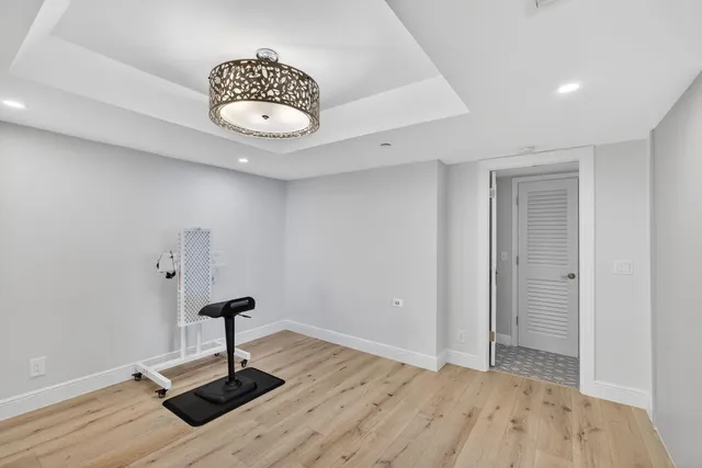 a view of a hallway with a room